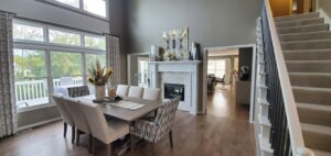 Elevate your interior living spaces, like this beautiful modern dining room with a classic twist, with TAMA Painting's professional painting services.